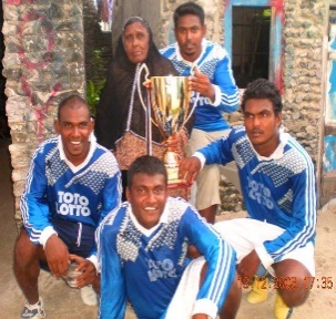 Young Eagle football team with tournament medals